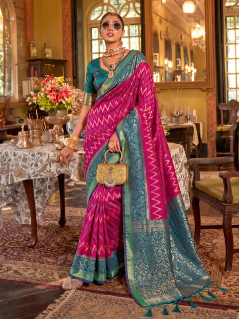 Rani Pink Silk Saree with Teal Border