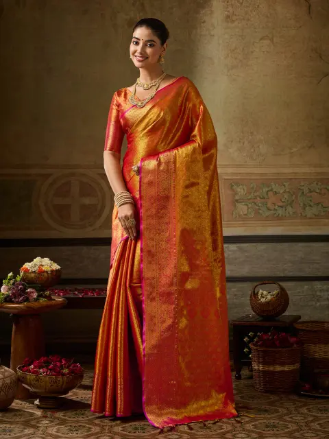 Orange Kanchivaram Silk Saree with Pink Border