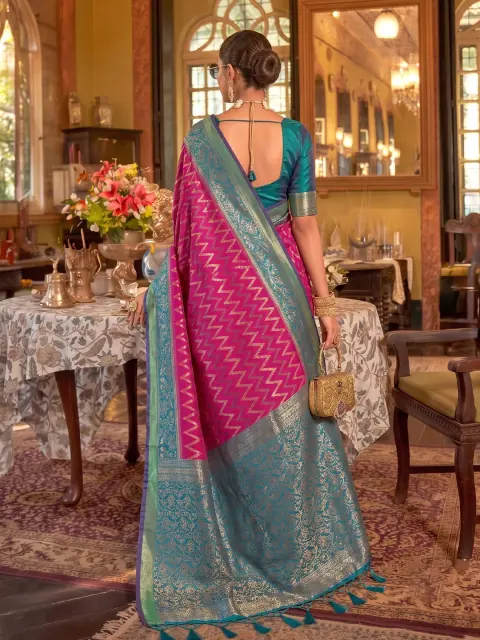 Rani Pink Silk Saree with Teal Border