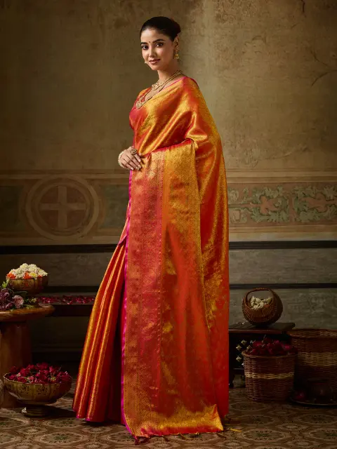 Orange Kanchivaram Silk Saree with Pink Border