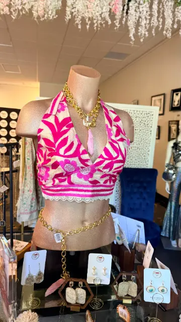 Pink floral halter crop top — original product view